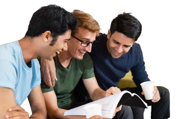 Three Fellow Students Reading Textbook Laughing Drinking.webp